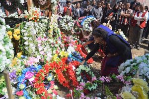 Representatives of Ao community women laying wreaths at the grave site of late Khriesavizo and late Bendangnungsang in Kohima.