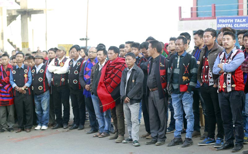 Women guard a spot along a road in Dimapur on Wednesday, February 15. (Right) Leaders of various tribal organisations–the ENPO (Mokokchung), Mokokchung Town Sumi community (Hoho) and the Gorkha Union of Mokokchung among others–seen here at a gathering point during the bandh on Wednesday, February 15, in Mokokchung. (Image credit: Toshi Kichu) 