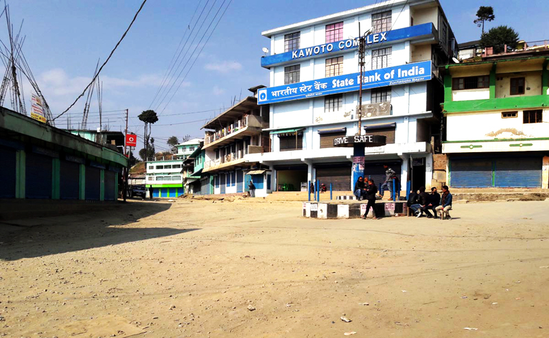 Volunteers guard an intersection in deserted Zunheboto town on February 15.