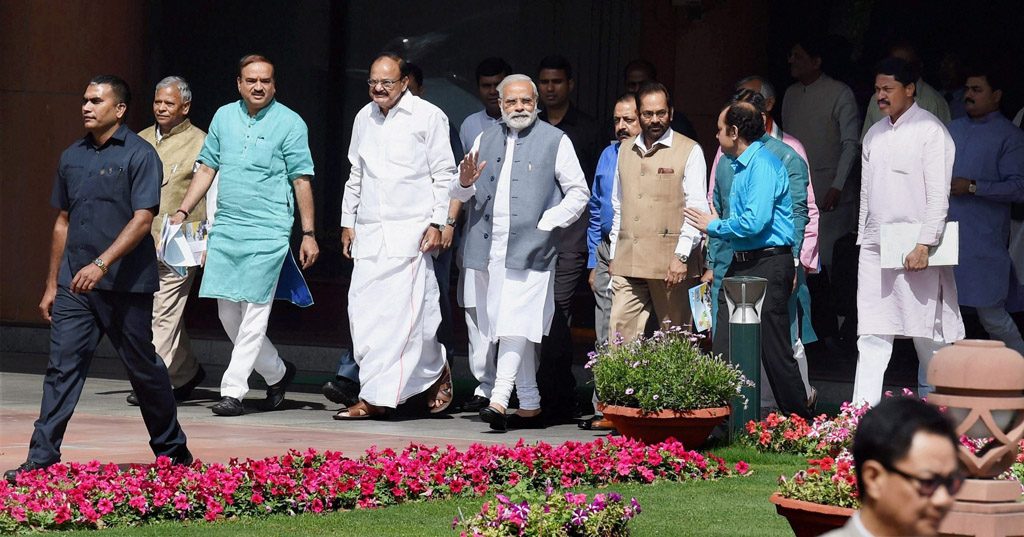 New Delhi : Prime Minister Narendra Modi with Urban Development Minister M Venkaiah Nadu, Parliamentary Affairs Minister Narendra Modi, MoSes Mukhtar Abbas Naqvi and Jitendra Singh coming out after attending BJP parliamentary party meeting at Parliament House in New Delhi on Tuesday. PTI Photo by Atul Yadav (PTI3_28_2017_000133B)