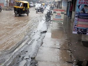 The pavements of Kalibari Road look like a mud stream after Monday’s light shower.