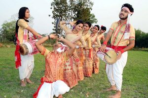  Youths perform Bihu dance for Rongali Bihu Festival at Pahukata village in Nagaon district of Assam on Wednesday.