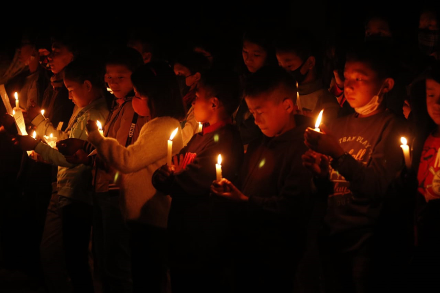 Candlelight service held at the main square of Peren town