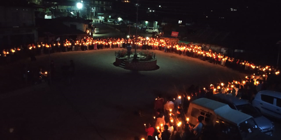 Candlelight service held at the main square of Peren town