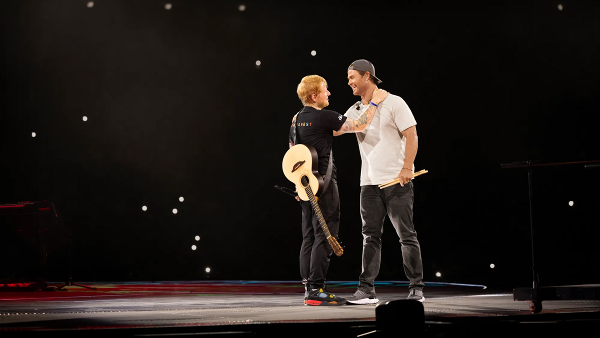 Chris Hemsworth surprises audience by playing drums at Ed Sheeran’s Romania concert