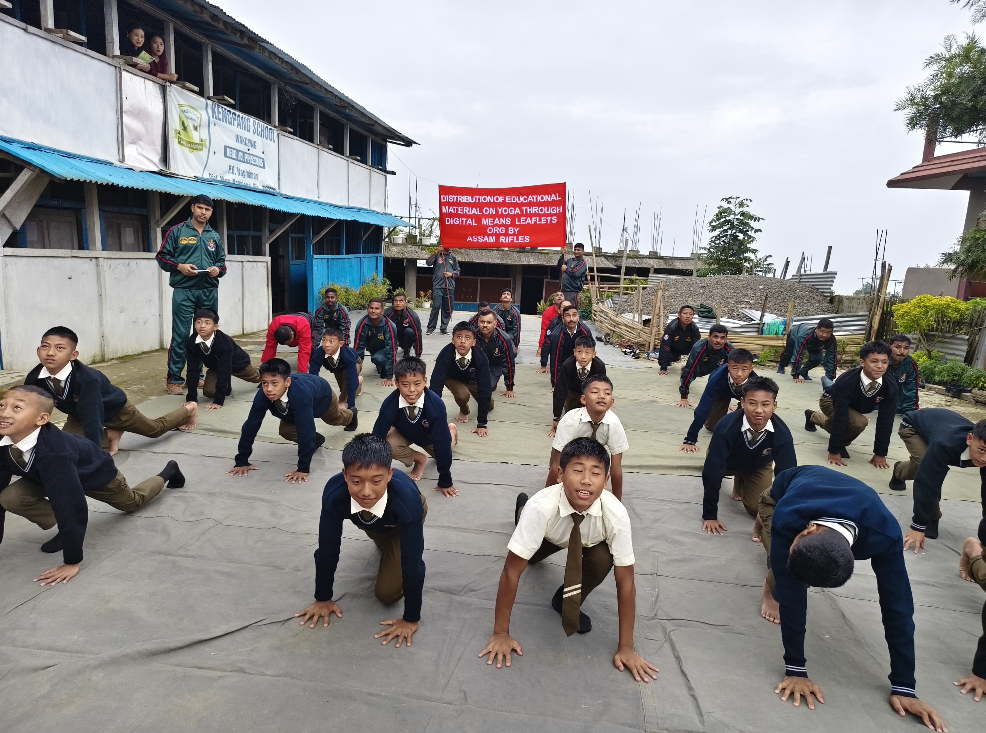 Assam rifle holds yoga session, distributes solar lights